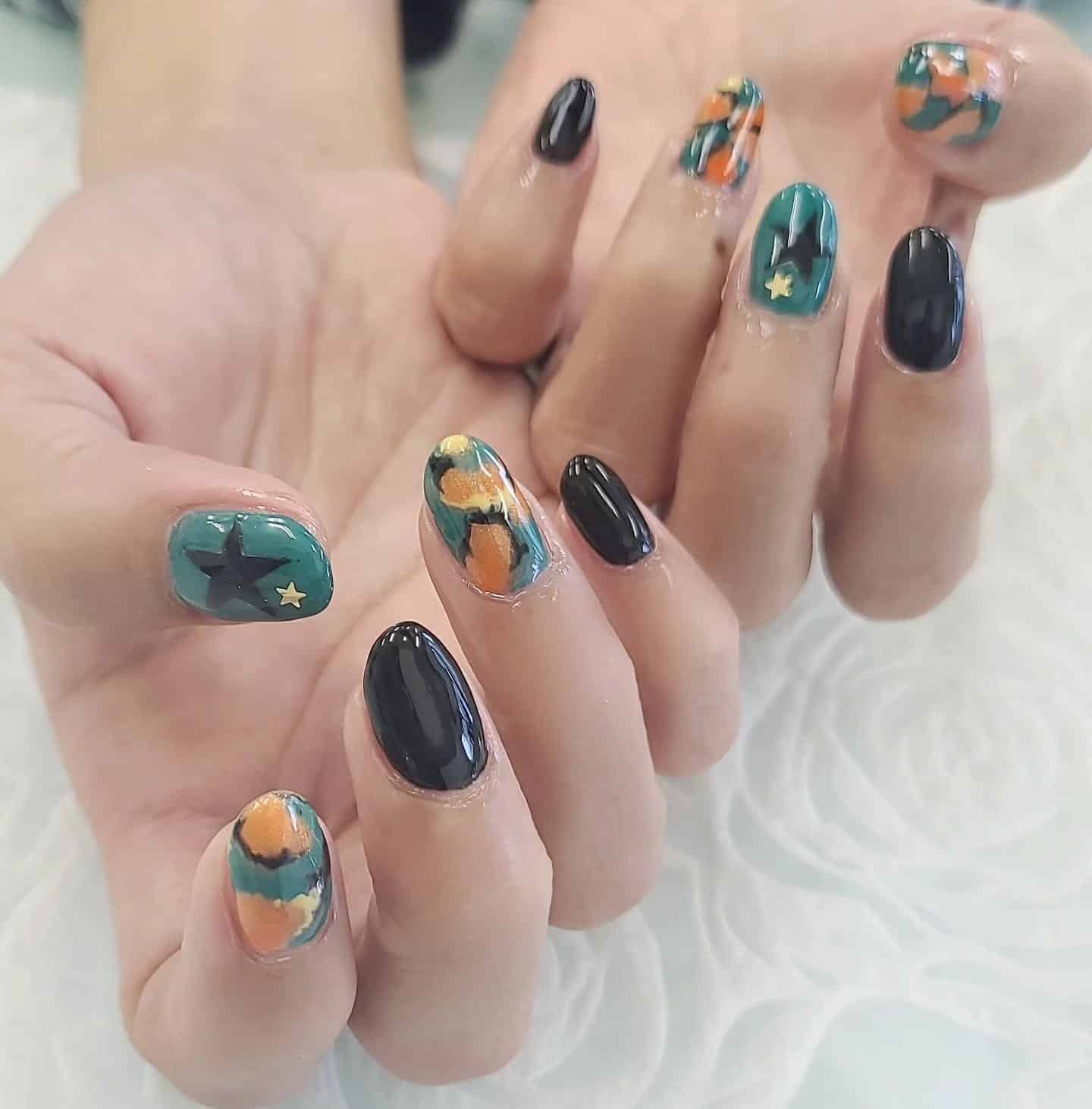 12. Midnight Star Camouflage - camouflage nail ideas