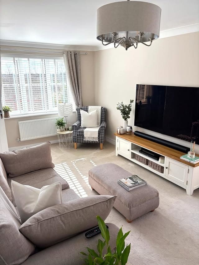 4. Neutral Family-Friendly Gathering Space - neutral living room ideas