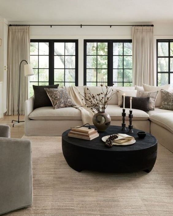 9. Modern Neutrals with Dark Accents - neutral living room ideas