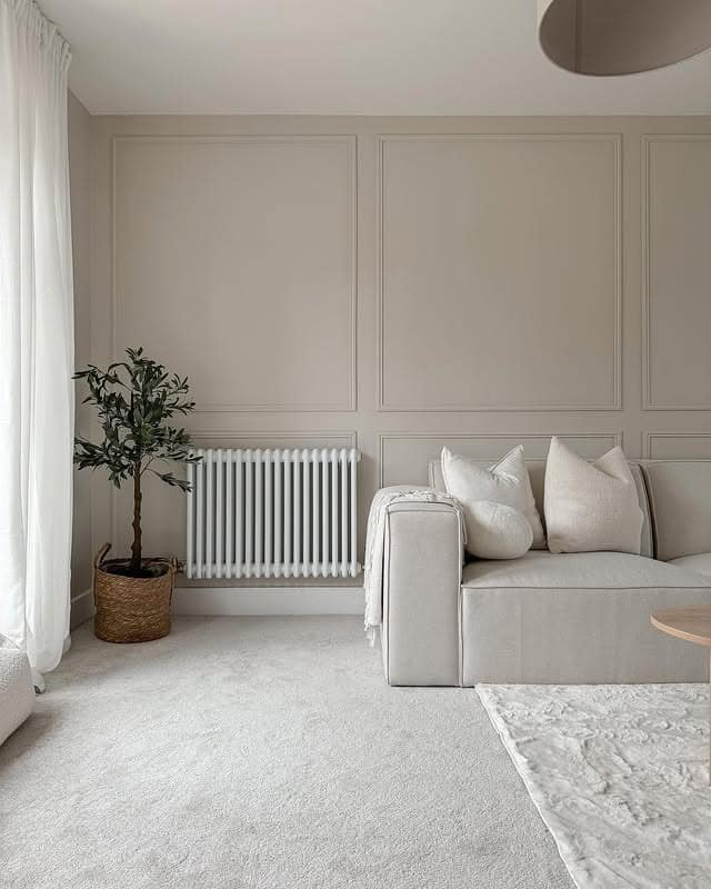 15. Modern Simplicity with Subtle Warmth - neutral living room ideas