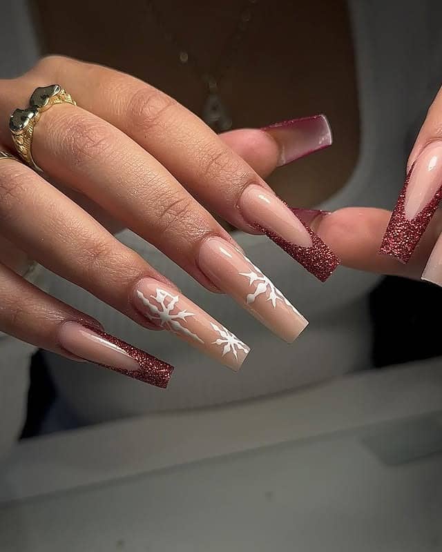 2. Deep Red Glitter Coffin Tips with Snowflake Detail - christmas french tip nail ideas