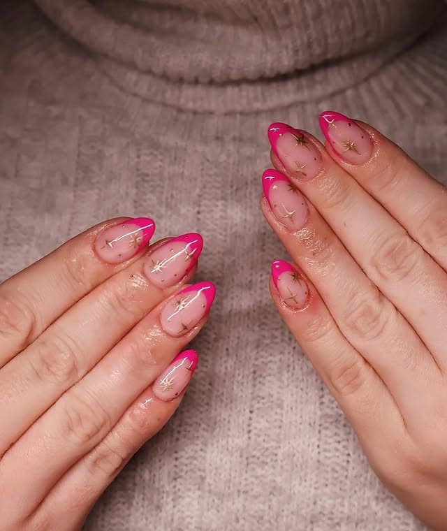 3. Pink French Tips with Golden Starlight - christmas french tip nail ideas