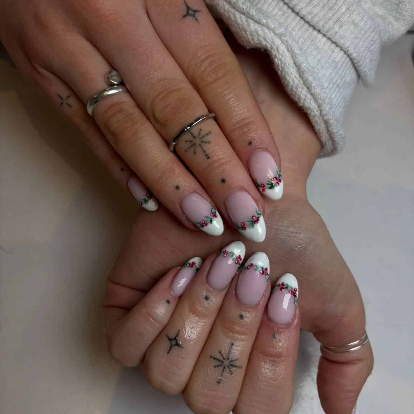 15. Classic Holly Accent French Tips - christmas french tip nail ideas