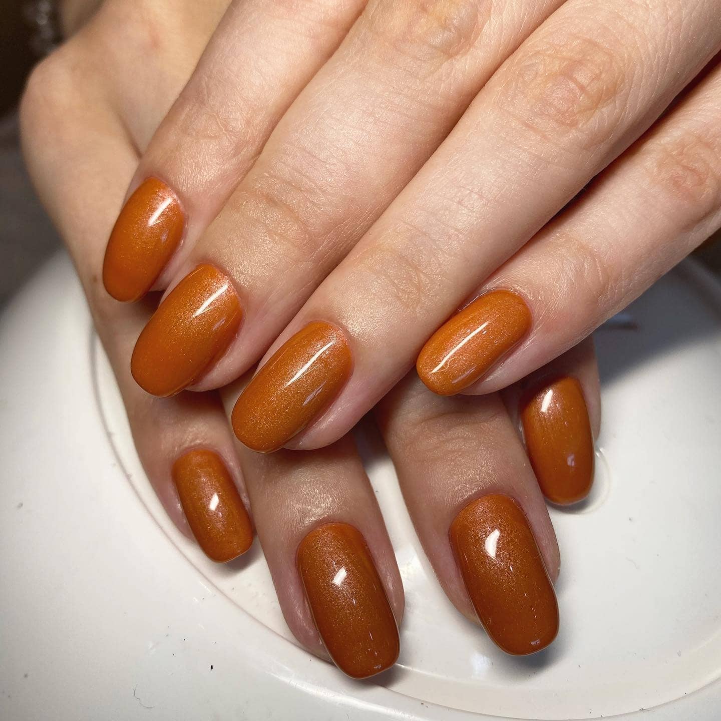 1. Glossy Copper Almond Nails - copper color nail ideas