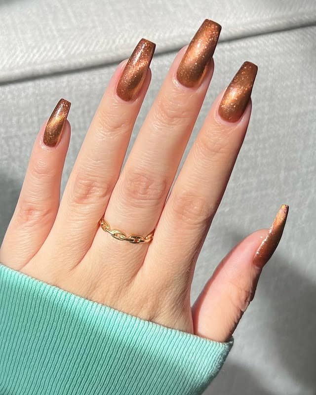 9. Golden Bronze Glam - copper color nail ideas