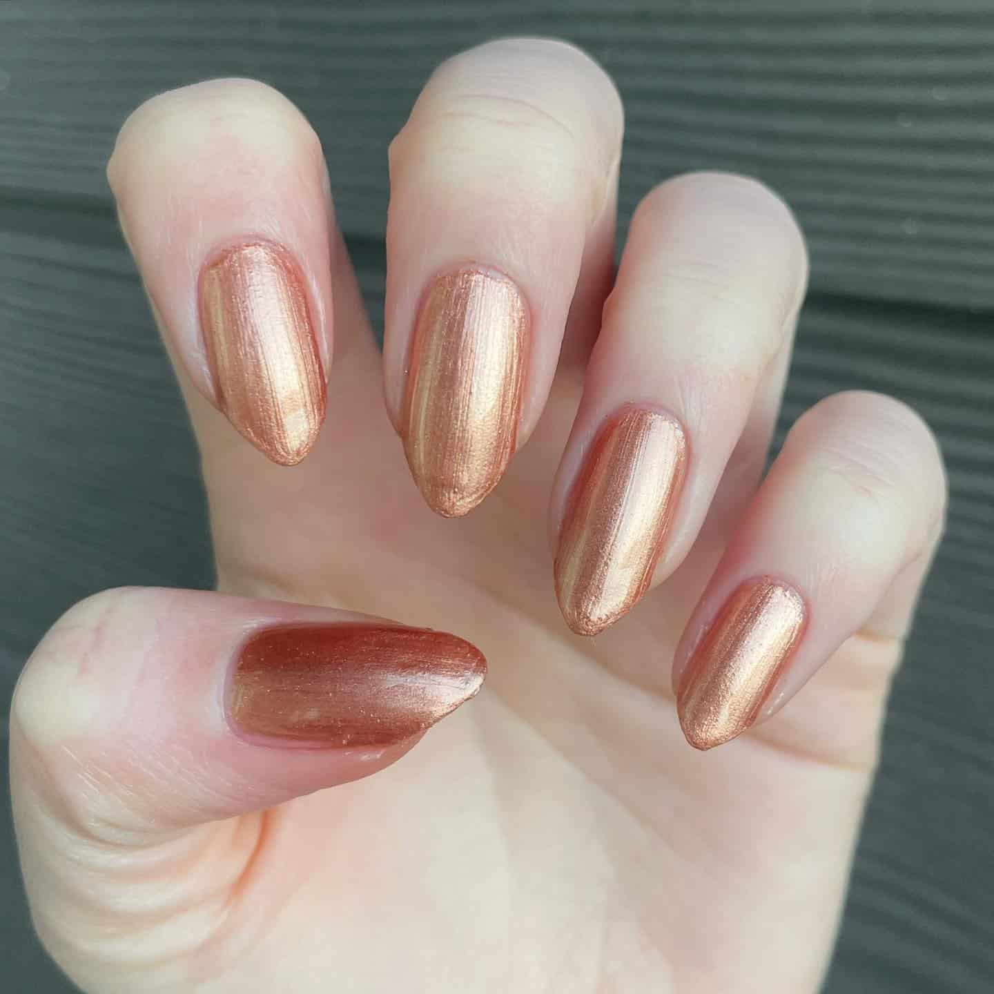 15. Light Copper Metallic Almond - copper color nail ideas