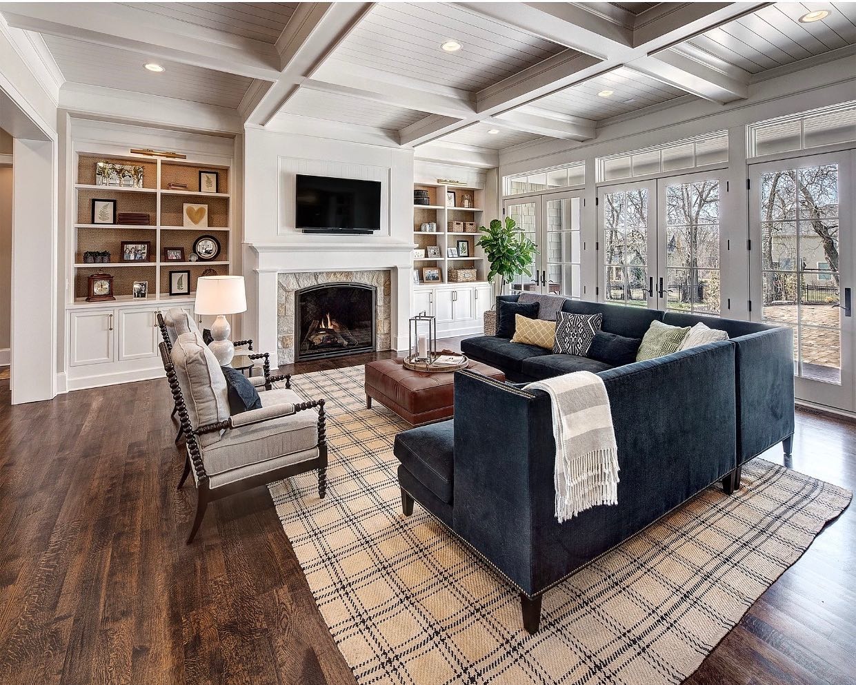 2. Classic Elegance with Dark Accents - traditional living room ideas