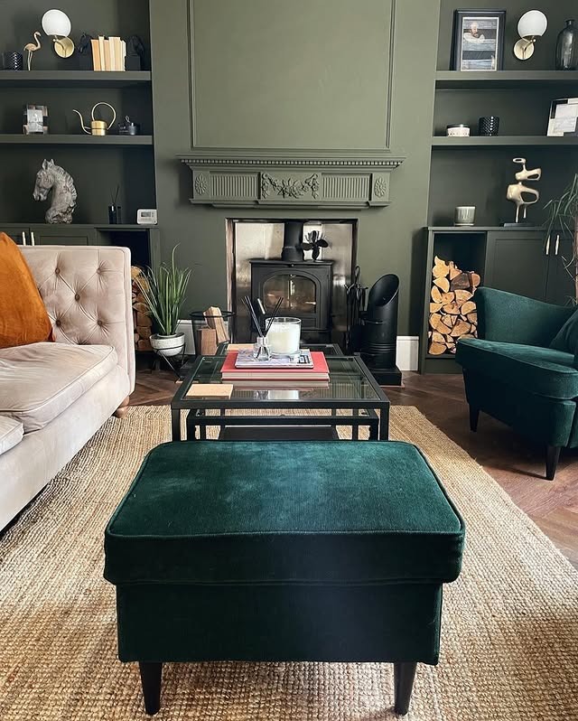 12. Moody Green with Classic Fireplace - traditional living room ideas