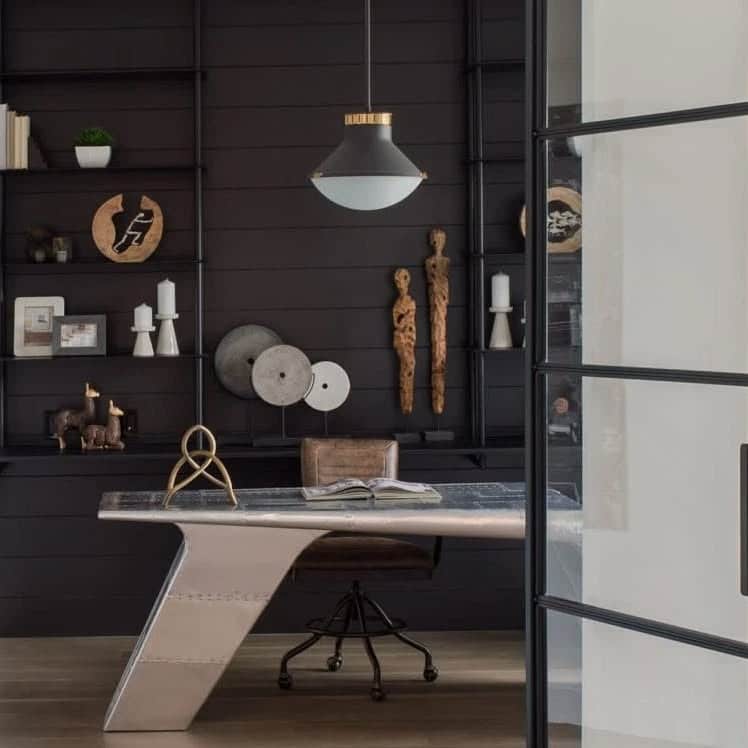 5. Industrial Edge with Sculptural Desk - black office ideas