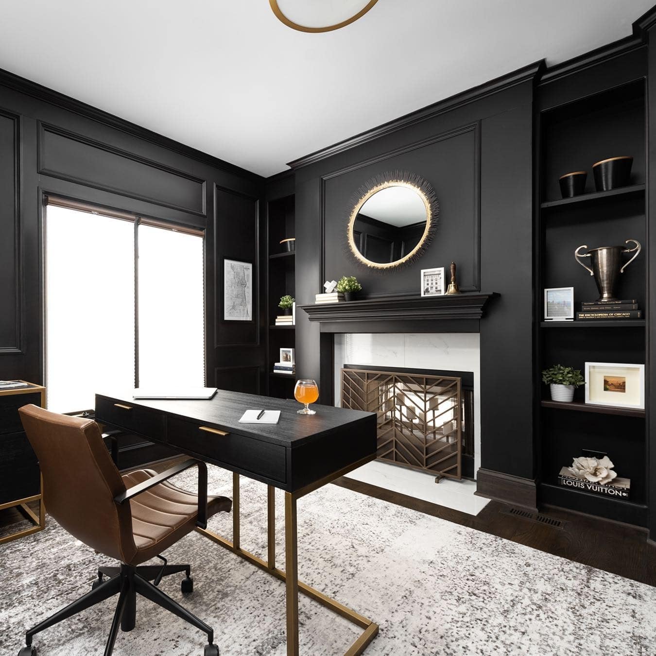 9. Contemporary Luxe with Fireplace Focus - black office ideas