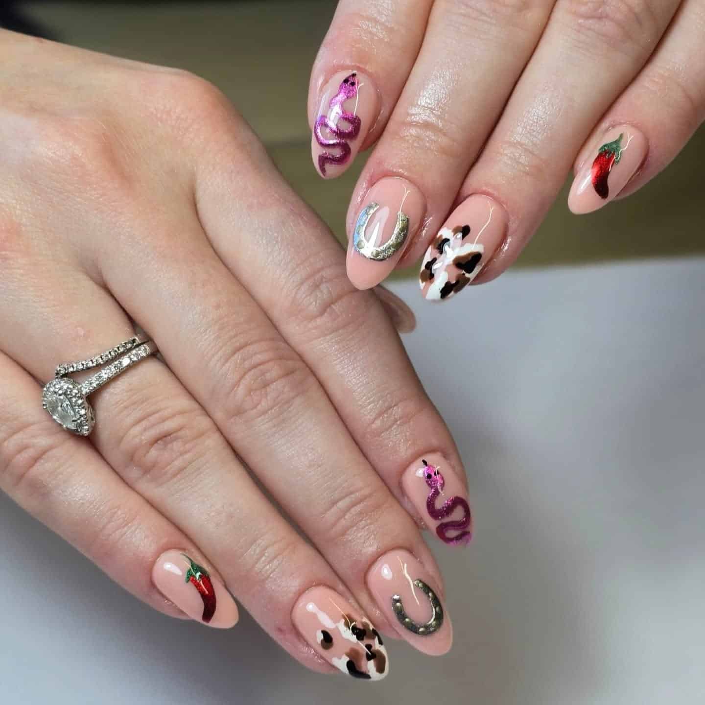 7. Desert Rodeo with Snakes & Spurs - cowgirl nail ideas