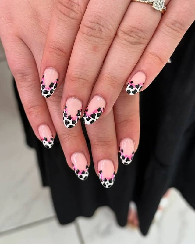 9. Cow Print French with Neon Touch - cowgirl nail ideas