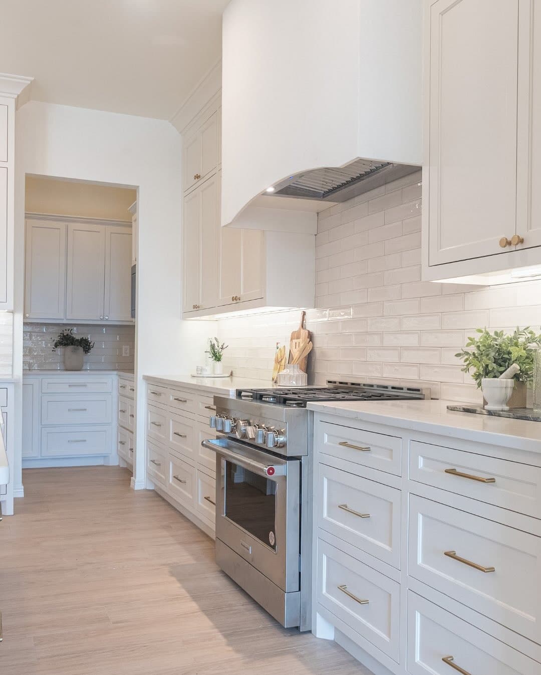 8. Classic White with Brass Handles - kitchen cabinet ideas