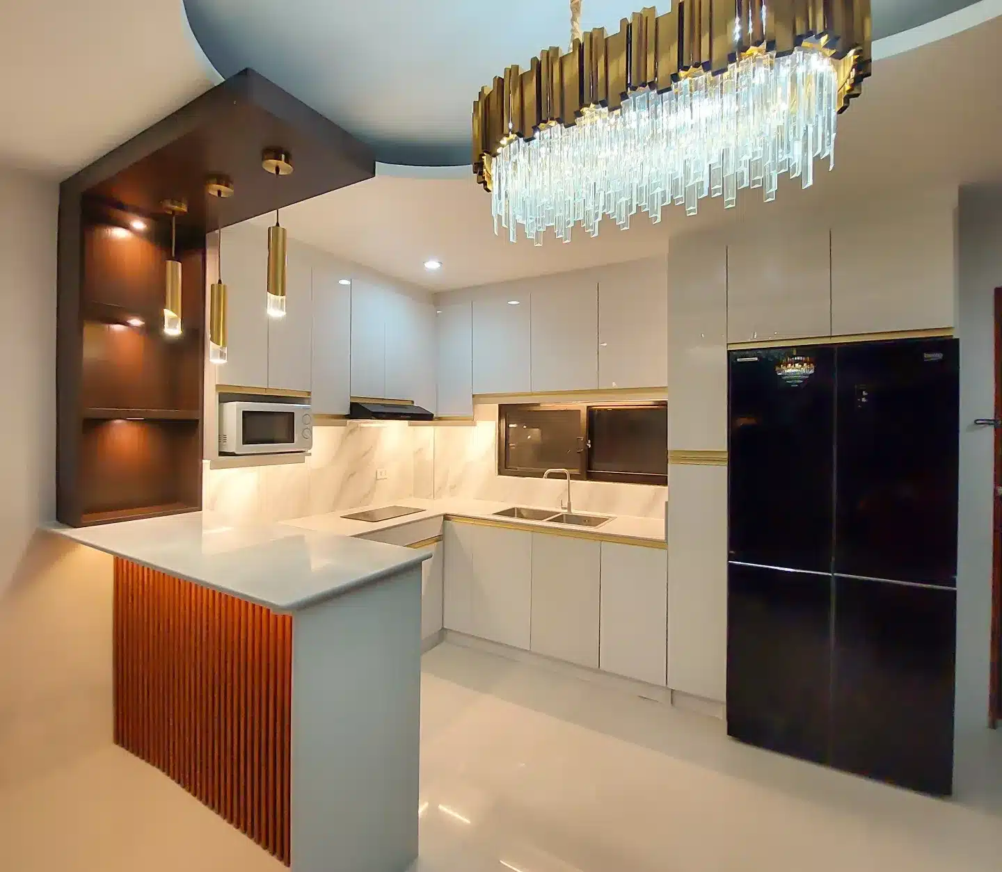 12. Luxe White with Gold and Crystal Lighting - kitchen cabinet ideas