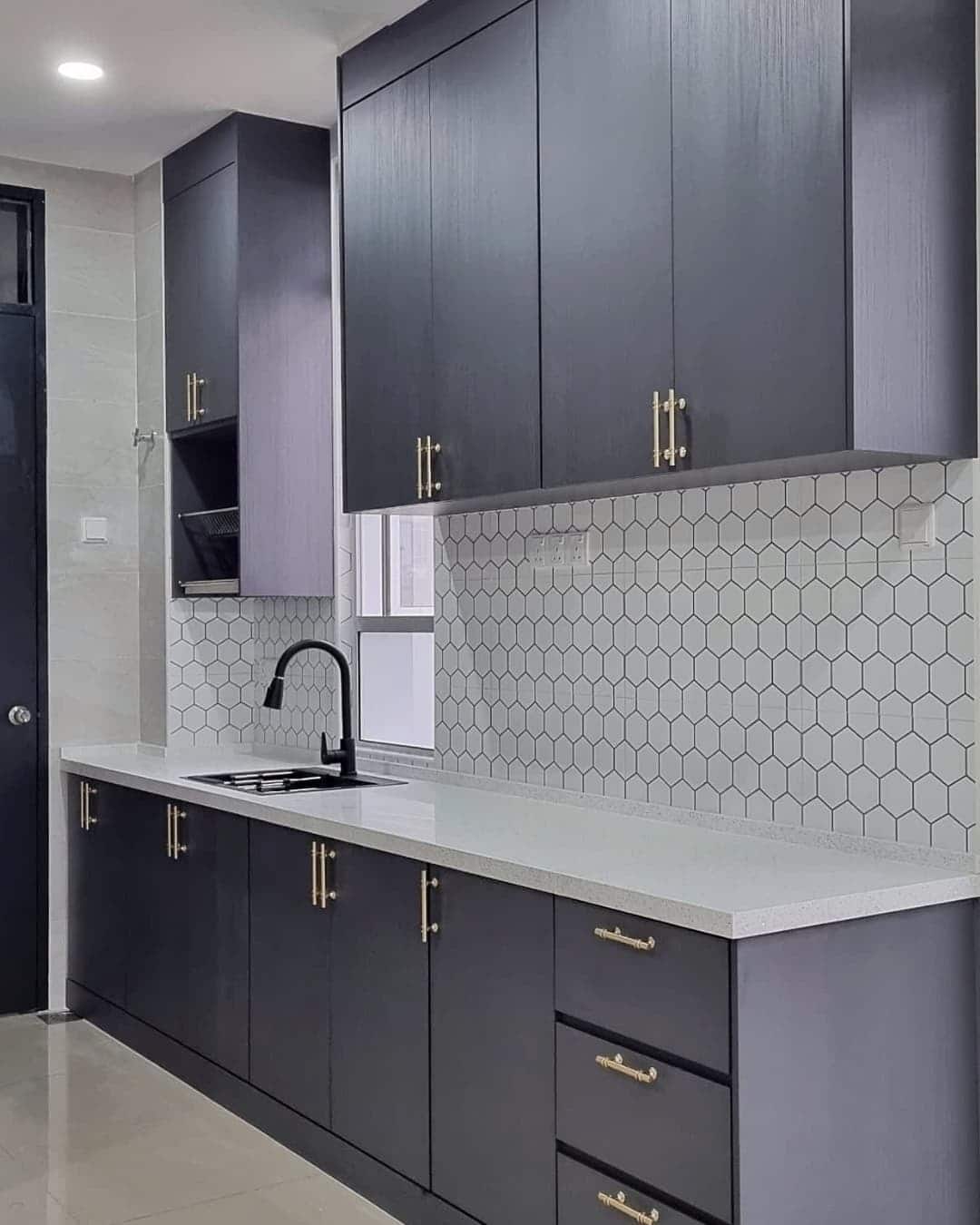 13. Charcoal Elegance with Hexagon Backsplash - kitchen cabinet ideas