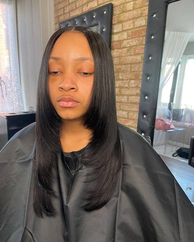 2. Feathered Mid-Length Silhouette - Quick Weave Hairstyles