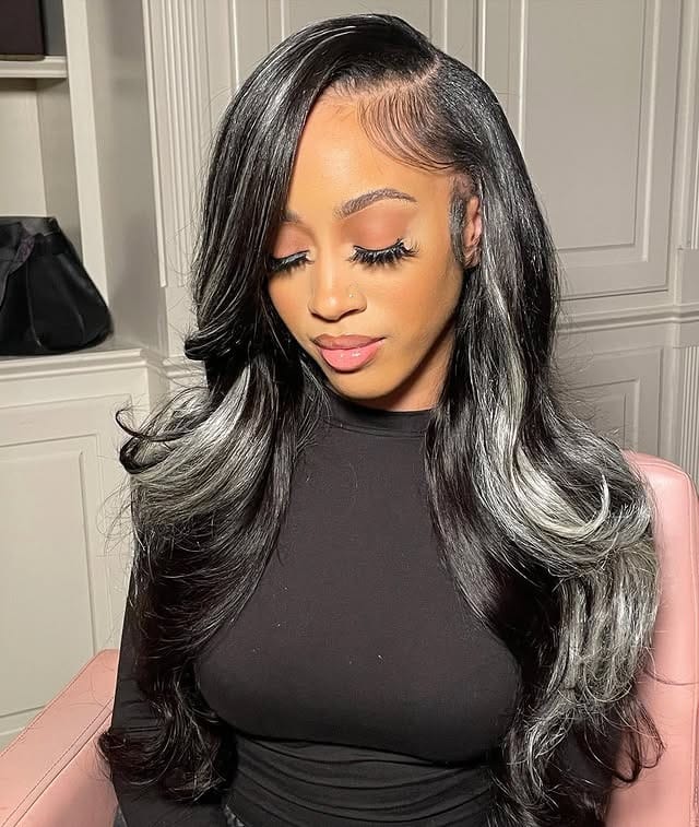 5. Voluminous Curls with Silver Streaks - Quick Weave Hairstyles