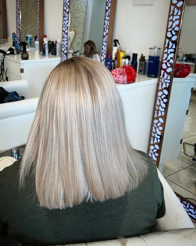 9. Polished Platinum Ash Blonde - Light Ash Blonde Hair Color