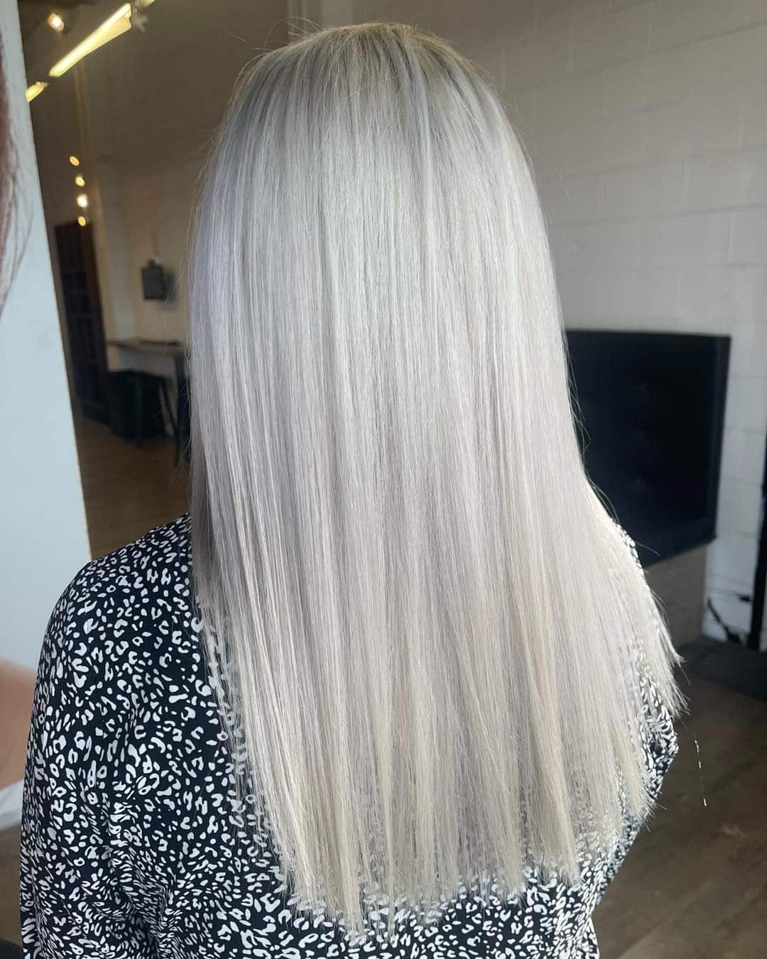 14. Platinum Ash Blonde Sleek Cut - Light Ash Blonde Hair Color