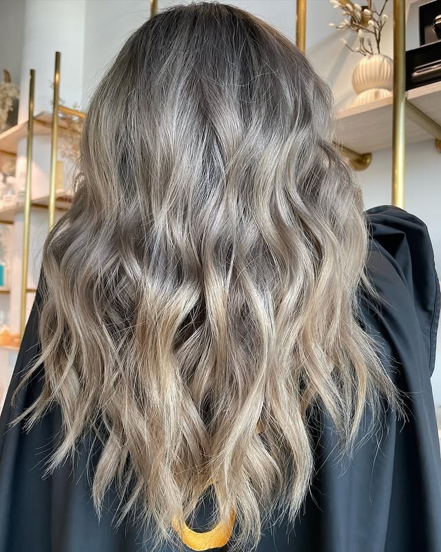 16. Smoky Ash Blonde Layers - Light Ash Blonde Hair Color