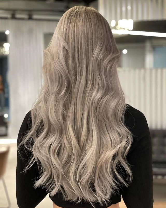 18. Long Ash Blonde Waves - Light Ash Blonde Hair Color