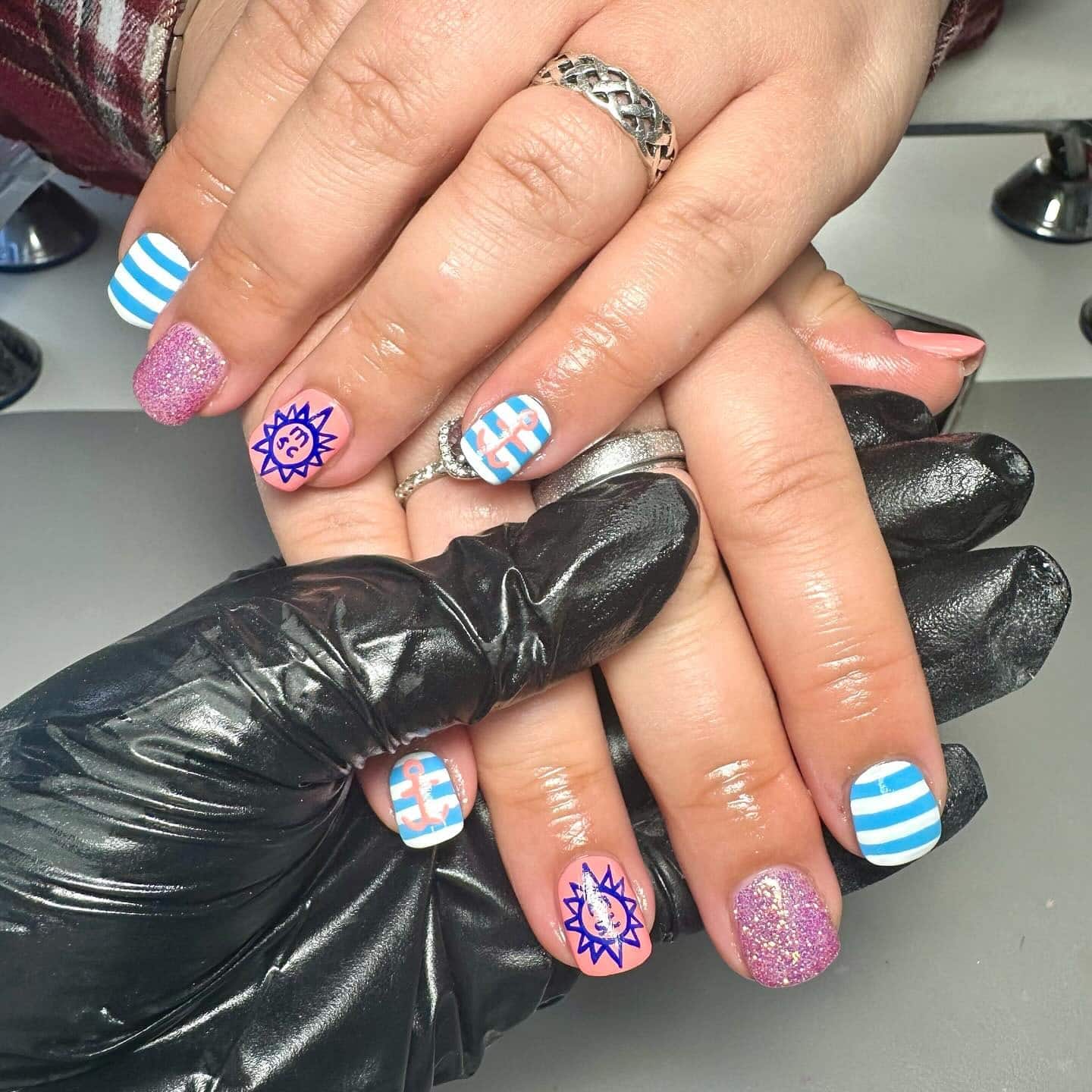 1. Nautical Stripes & Symbols - cruise ship nail ideas