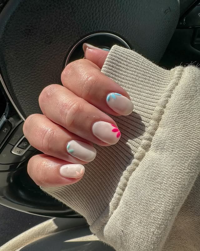 2. Minimal Bloom Accents - cute flower nail ideas