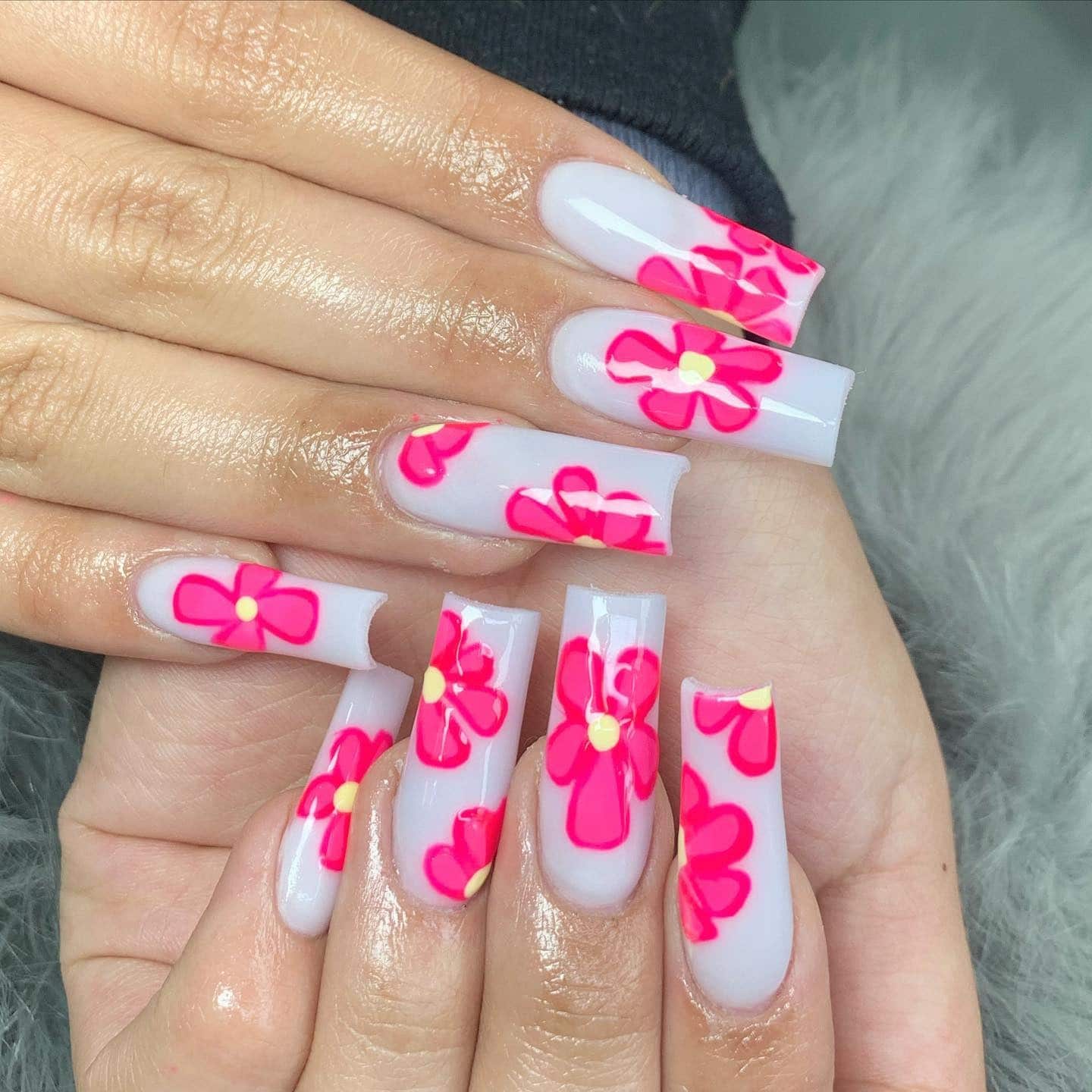 5. Neon Blossom Pop - cute flower nail ideas