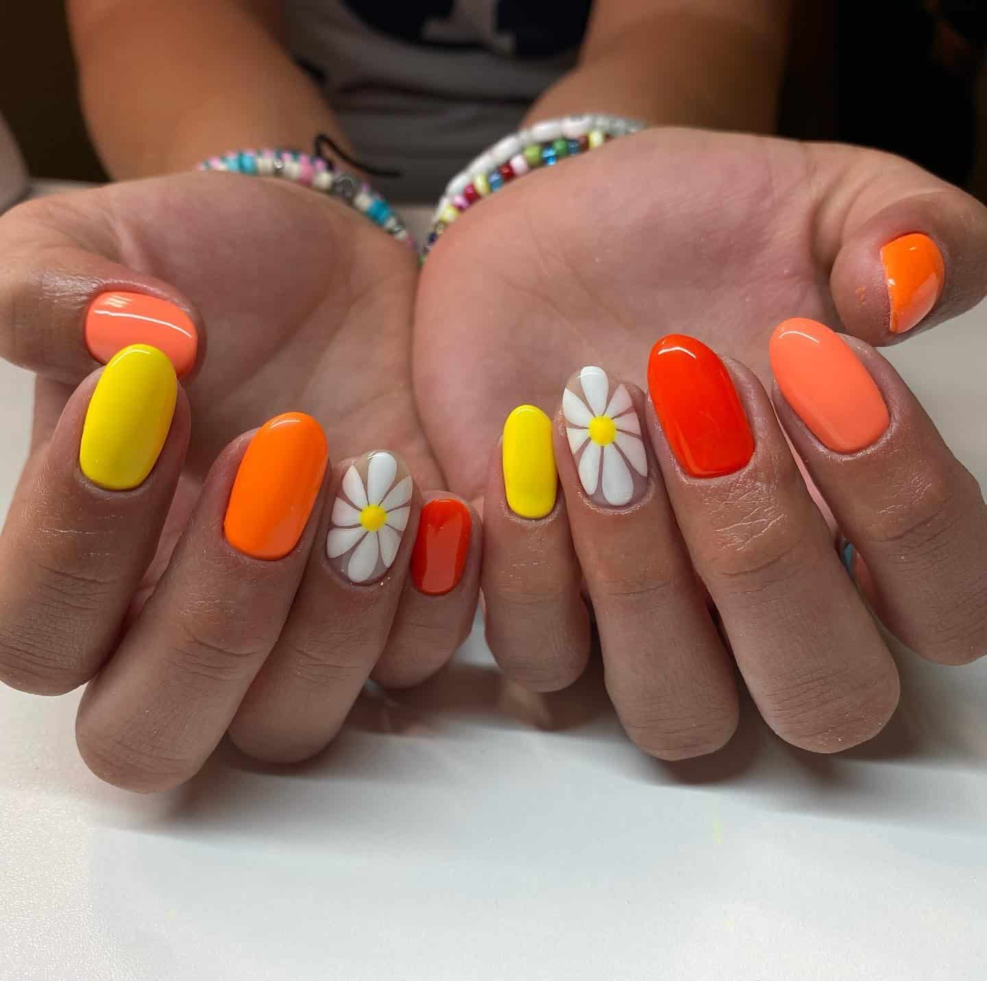 19. Citrus Daisy Mix - cute flower nail ideas