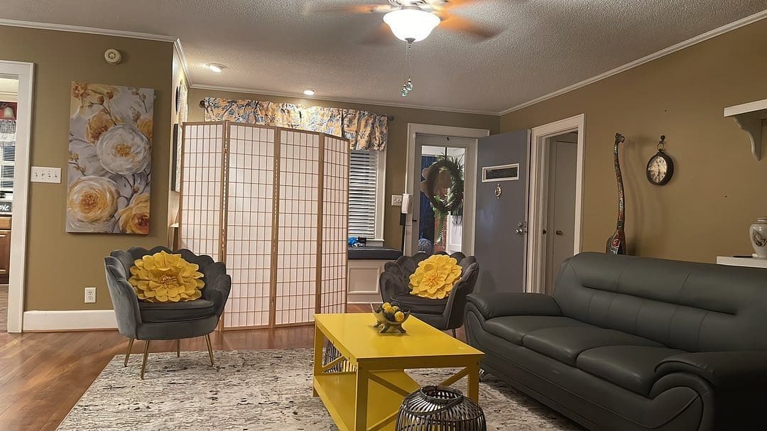 9. Playful Comfort with Retro Inspiration - gray and yellow living room ideas