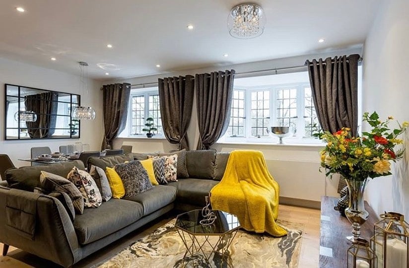 12. Layered Elegance with Gray and Mustard - gray and yellow living room ideas