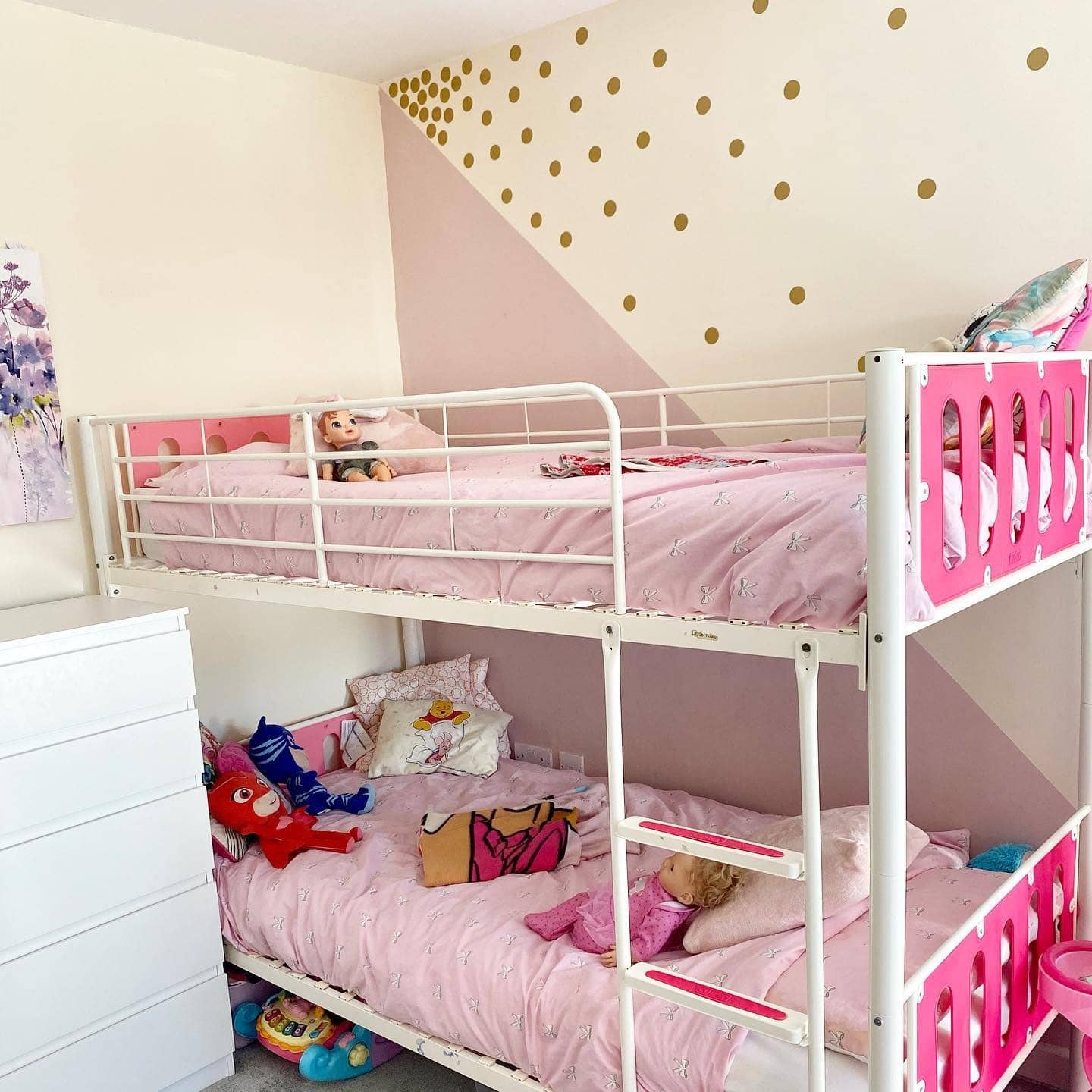 21. Playful Geometry with Golden Accents - pink and gold bedroom ideas