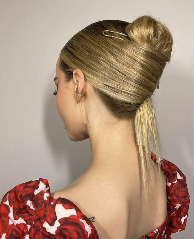 1. Sleek Twisted Bun with Golden Blonde Highlights - Sleek Hairstyles
