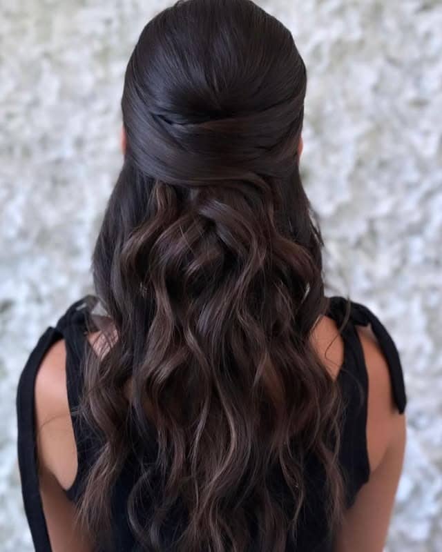 3. Half-Up Elegance with Dark Mocha Waves - Sleek Hairstyles