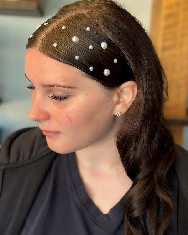 8. Pearl-Accented Sleek Side Part with Dark Brunette - Sleek Hairstyles