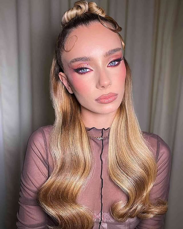 10. Sculpted Top Twist with Buttery Blonde Length - Sleek Hairstyles