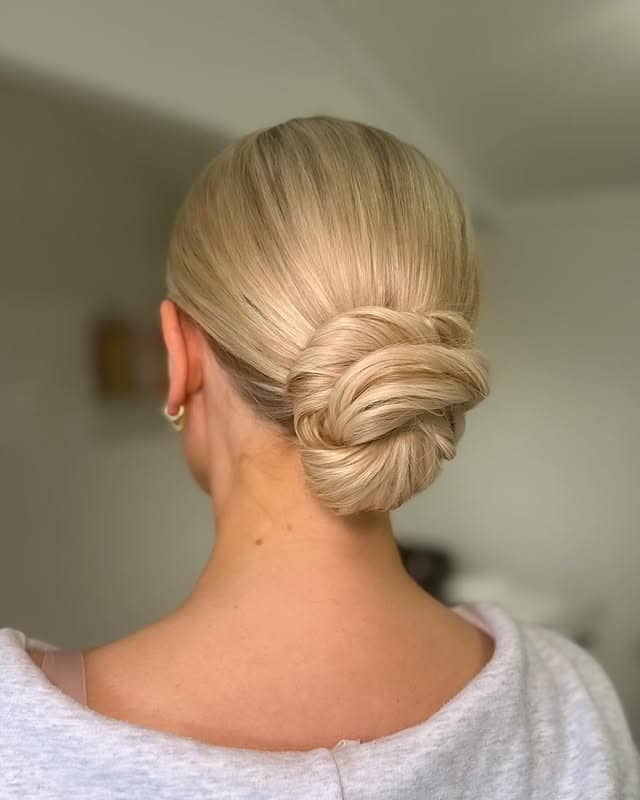 17. Twisted Chignon in Platinum Blonde - Sleek Hairstyles