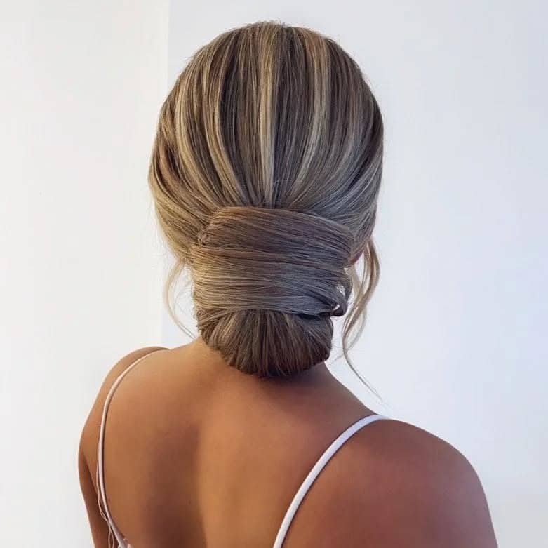 19. Wrapped French Bun with Ash Blonde Highlights - Sleek Hairstyles