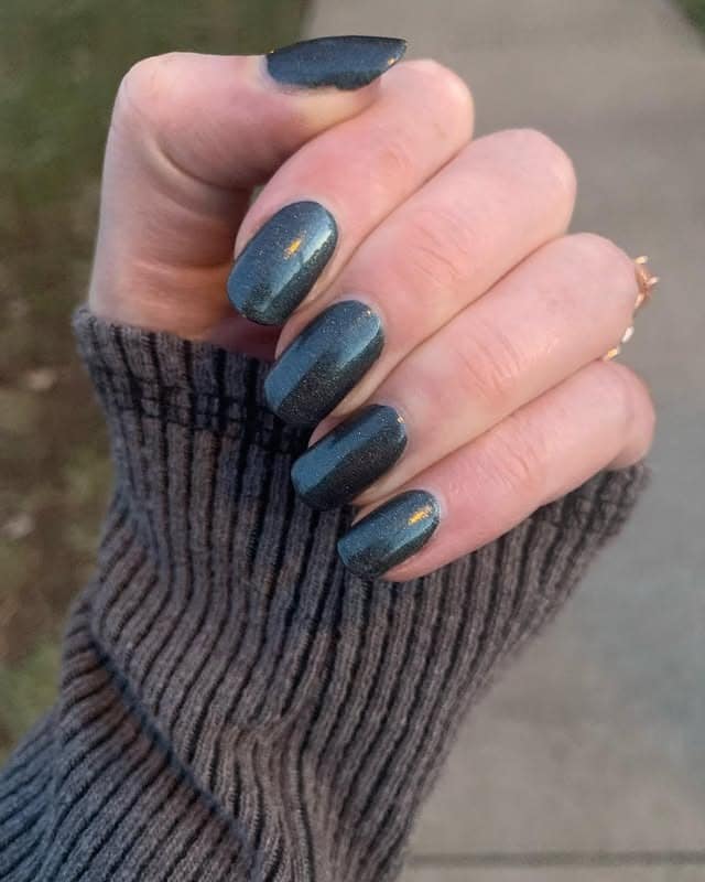 9. Metallic Teal Shine - dark teal nail ideas