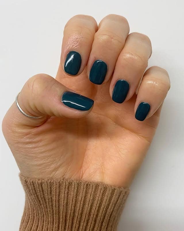 10. Refined Teal Minimalism - dark teal nail ideas