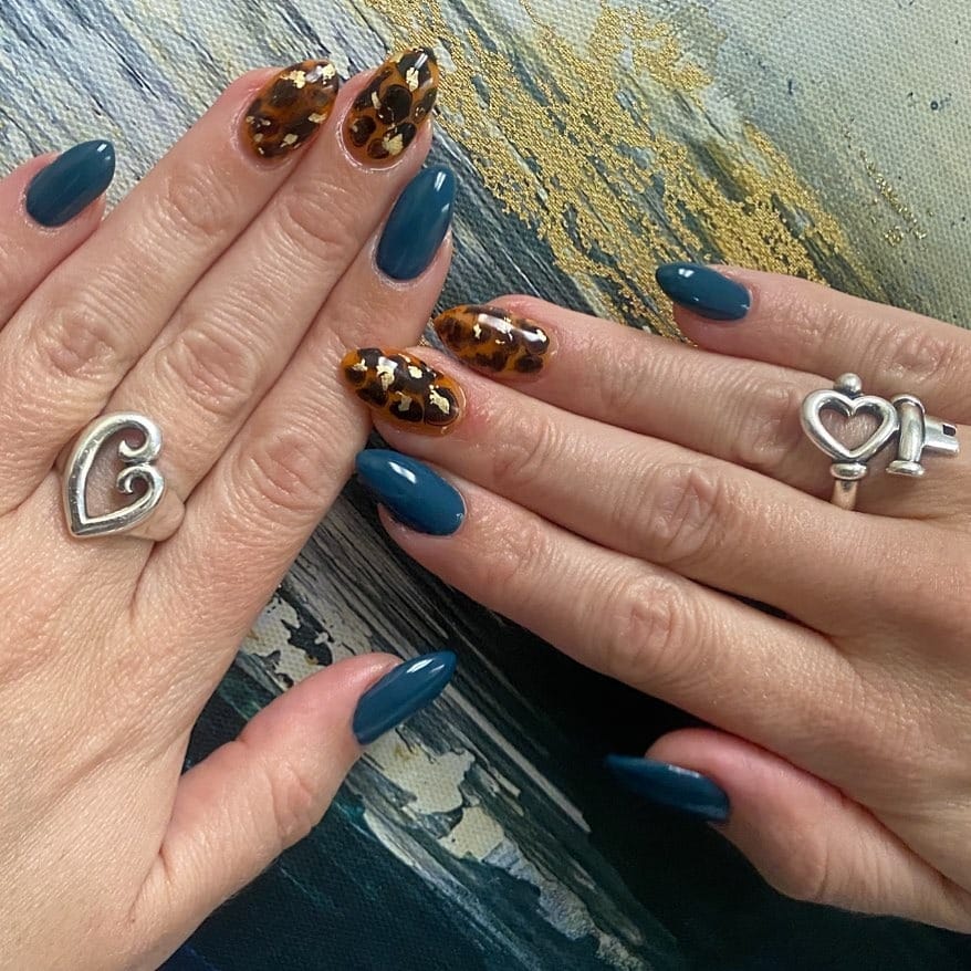 14. Teal with Tortoiseshell Accents - dark teal nail ideas