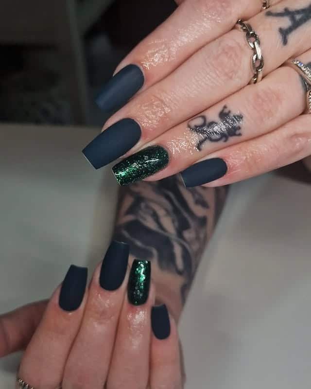 15. Matte Teal with Sparkle Accent - dark teal nail ideas