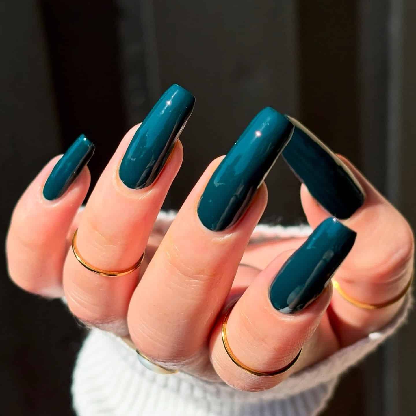 22. Glossy Long Coffin Teal - dark teal nail ideas
