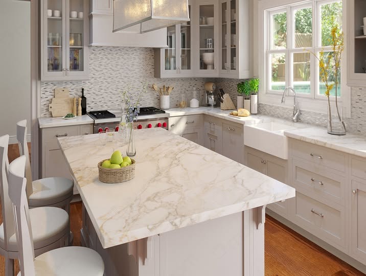 1. Classic Elegance with Cream Marble - countertop ideas for kitchen