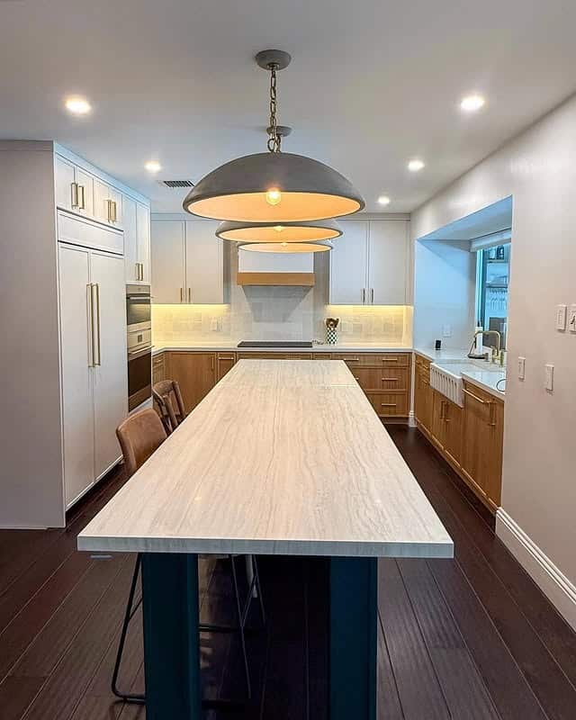 2. Streamlined Modern with Light Stone - countertop ideas for kitchen