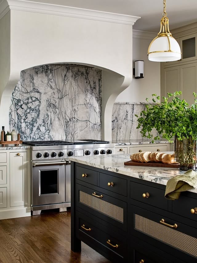 17. Classic Elegance with Bold Marble Walls - countertop ideas for kitchen
