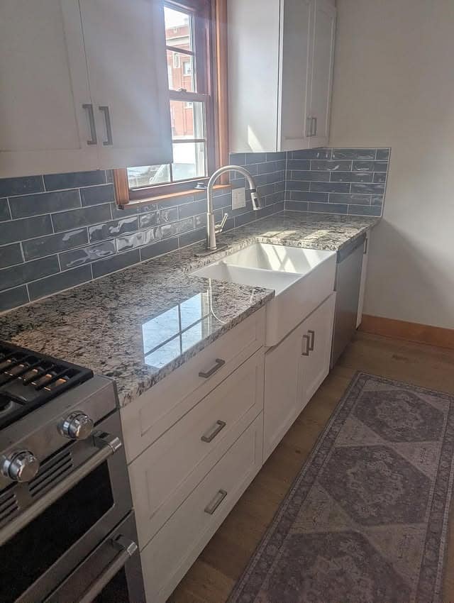 19. Granite Texture with Coastal Blue Accents - countertop ideas for kitchen