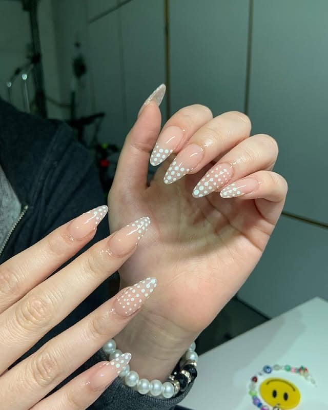 7. Snowy Tipped Dots - dot nail ideas