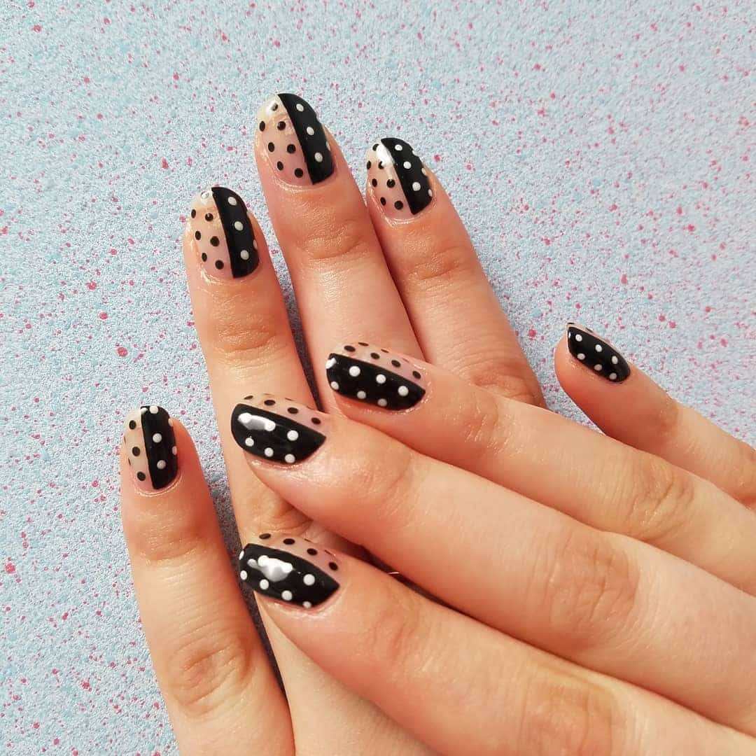10. Modern Monochrome Split Dots - dot nail ideas