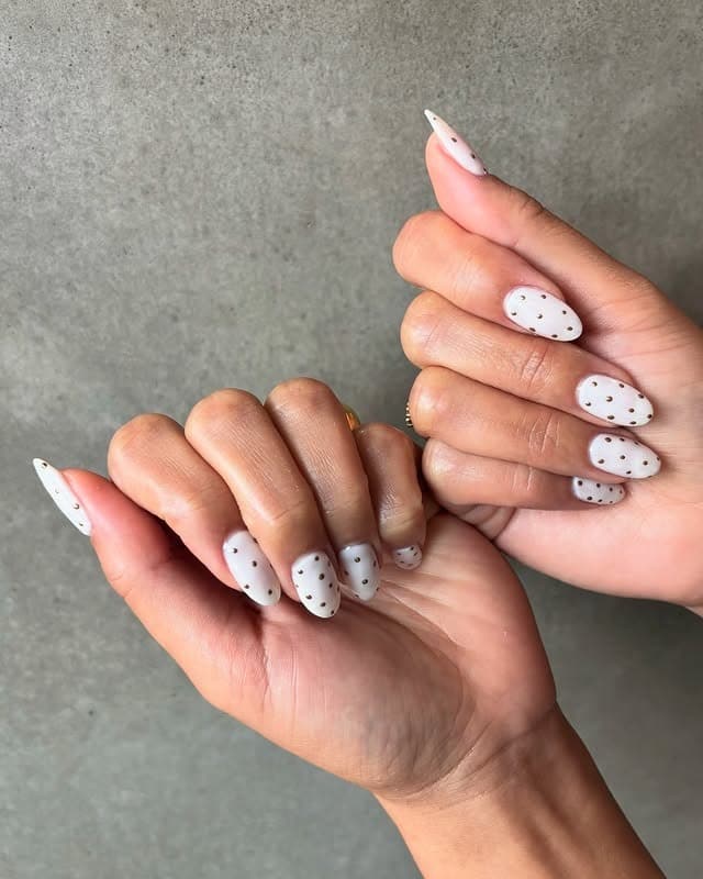 11. Soft White with Golden Dot Elegance - dot nail ideas
